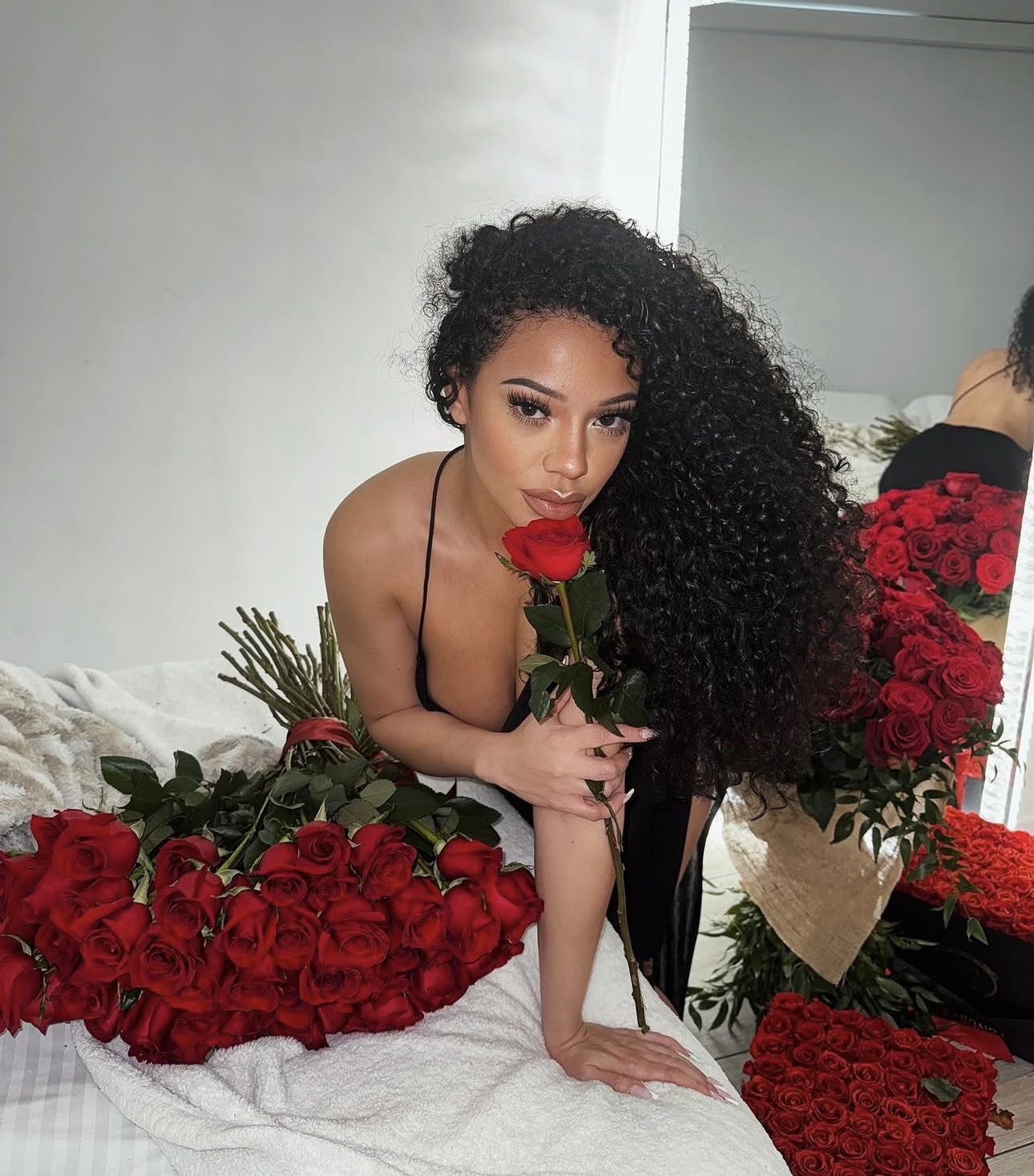 Natalie with red roses